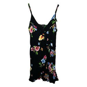 Mini black dress with colorful flowers: blue, orange, pink.